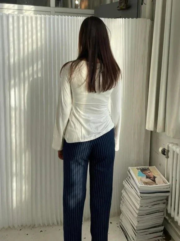 Merle – Blusa elegante con detalle de nudo
